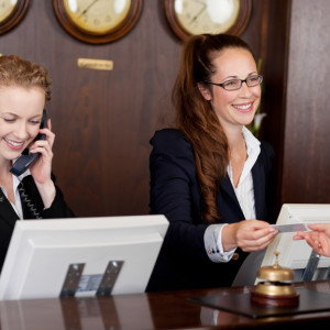 Two receptionists at a reception desk